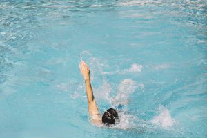 Tunstall | Guy swimming backstroke-Fun works